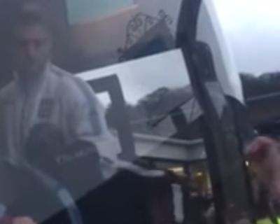 Angry Aston Villa fans confront the players and coaching staff as they board the team bus after a 1-1 draw at Wycombe in the FA Cup 3rd round