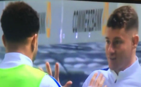 Kyle Walker and Ross Barkley play rock-paper-scissors at half-time of Germany 2-3 England
