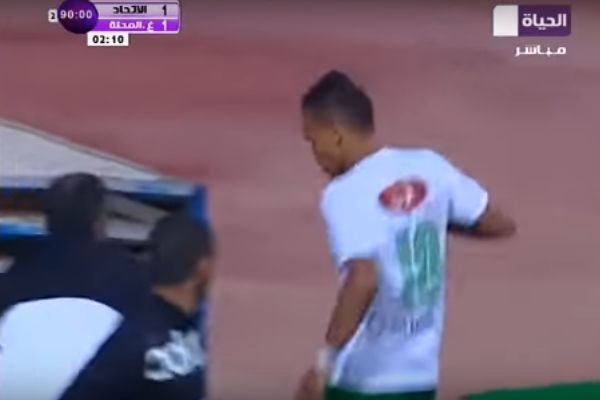 Egpytian Premier League player Youssef Obama runs down the tunnel after missing a penalty for his side