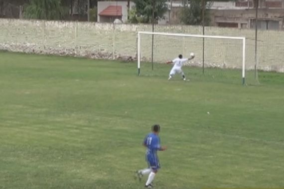 La Armonía's Gerónimo Tieser concedes a long shot from Pacífico's Curuchet after ball juggling in an Argentinian regional league clash