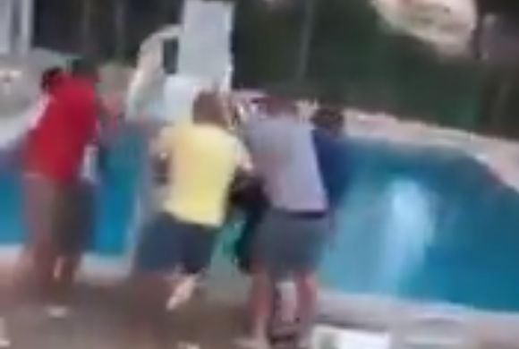 Middlesbrough fans throw man wearing Newcastle shirt in pool on holiday