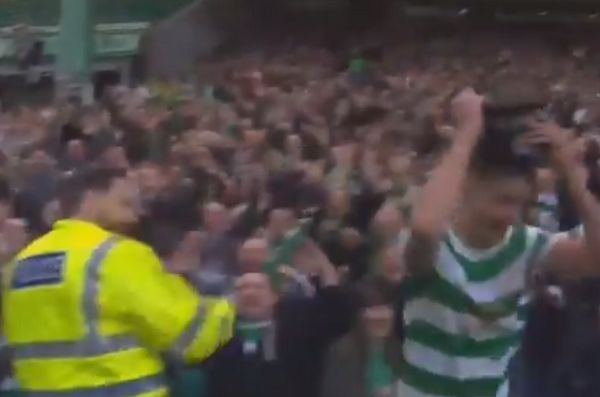 Celtic's Mikael Lustig steals police hat celebrating James Forrest goal v Rangers