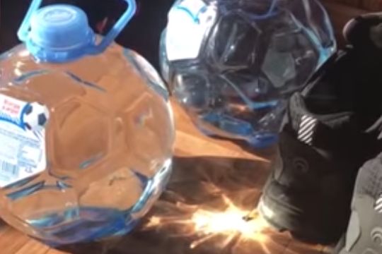 Reflective, novelty, football-shaped Russian World Cup water bottles are causing things to catch alight