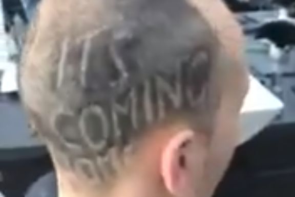 Man gets "it's coming home" shaved onto his head