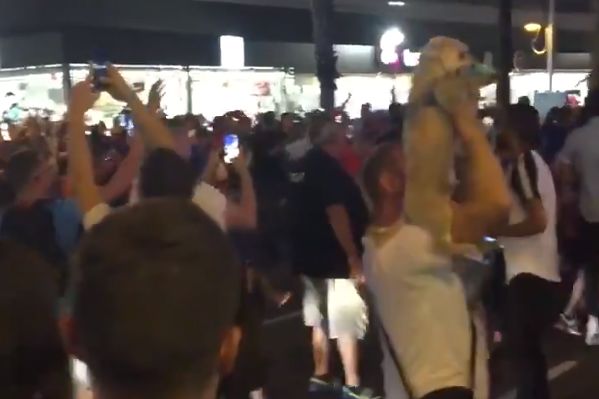 France fan dances with dog celebrating 1-0 World Cup semi-final win over Belgium
