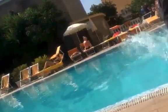 Man pushes woman into swimming pool after she yells "it's not coming home" at him in Italy