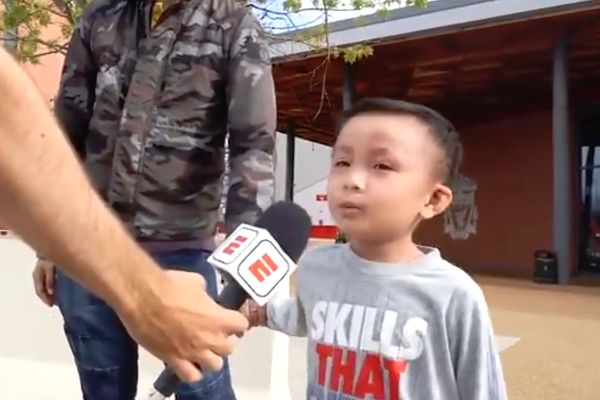 A child from Hong Kong who travelled to Anfield to watch their Champions League win over PSG sings You'll Never Walk Alone and more for ESPN