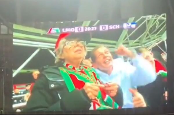 Old lady knits in stands at Lokomotiv Moscow v Schalke 04