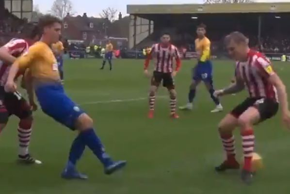 Mansfield Town's Danny Rose says "megs" after nutmegging Lincoln City's Harry Anderson during a League Two match