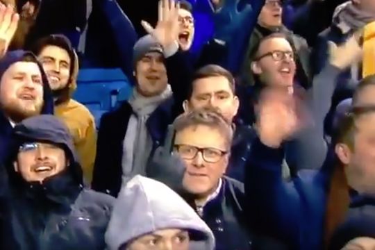 A Millwall fan sticks his middle finger up at the camera during their 3-2 FA Cup win over Everton at The Den