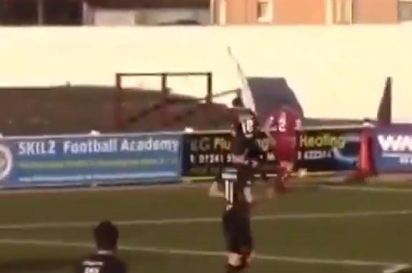 Arbroath goalkeeper's kick goes out for a corner in strong winds during abandoned match against Stranraer