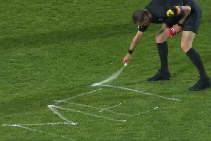 French Ligue 2 referee gives away his cards and writes "merci" with vanishing spray in last game of the season