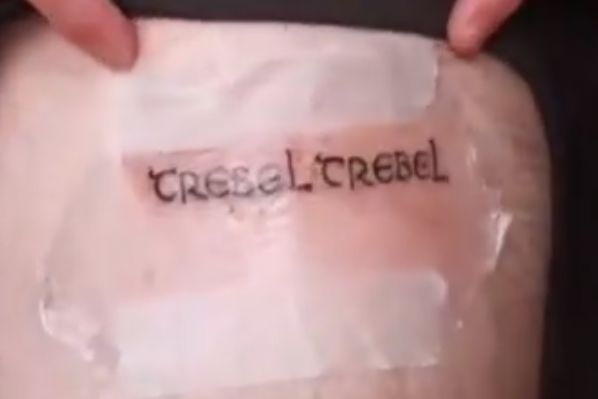 Celtic fan's misspelled 'treble treble' tattoo, reading 'trebel trebel'