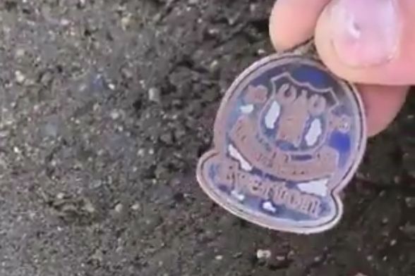 Builder puts Everton badge under Liverpool supporter's concrete floor
