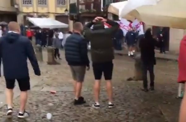 England fans are dismayed as Portuguese police confiscate their ball in Guimarães