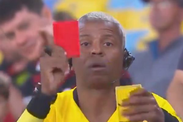 Flamengo fan dressed in full referee kit at Copa Libertadores match against Internacional