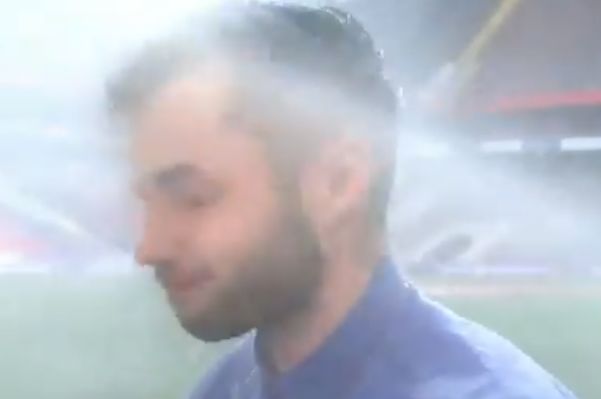 Sprinkler soaks reporter Evgeniy Evnevich at CSKA Moscow's stadium