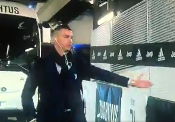 Cristiano Ronaldo pretends to slap the hands of missing Juventus fans before a game against Inter Milan amid the coronavirus outbreak