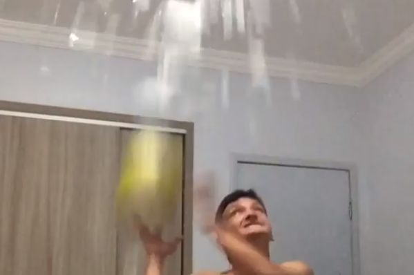 Young Barcelona fan smashes ceiling light by heading ball at it