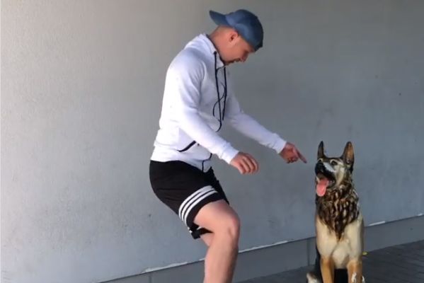 Belgian freestyler Eric Szyburski tries to place a dog ornament on a ball