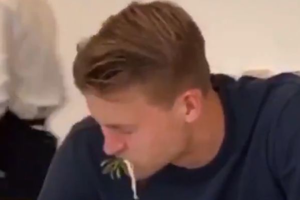 Juventus defender Matthijs de Ligt stuffs food into his mouth, as caught on camera by Juan Cuadrado