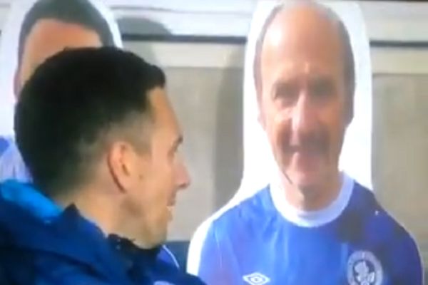 Stewart Downing chats with cardboard cutout of supporter at Blackburn vs Middlesbrough