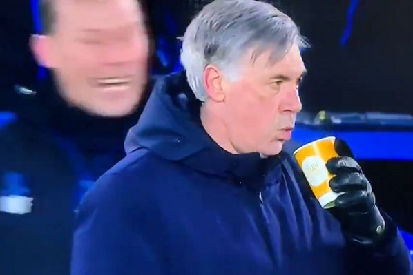 Carlo Ancelotti blows on his tea as Everton celebrate Bernard's winner against Spurs